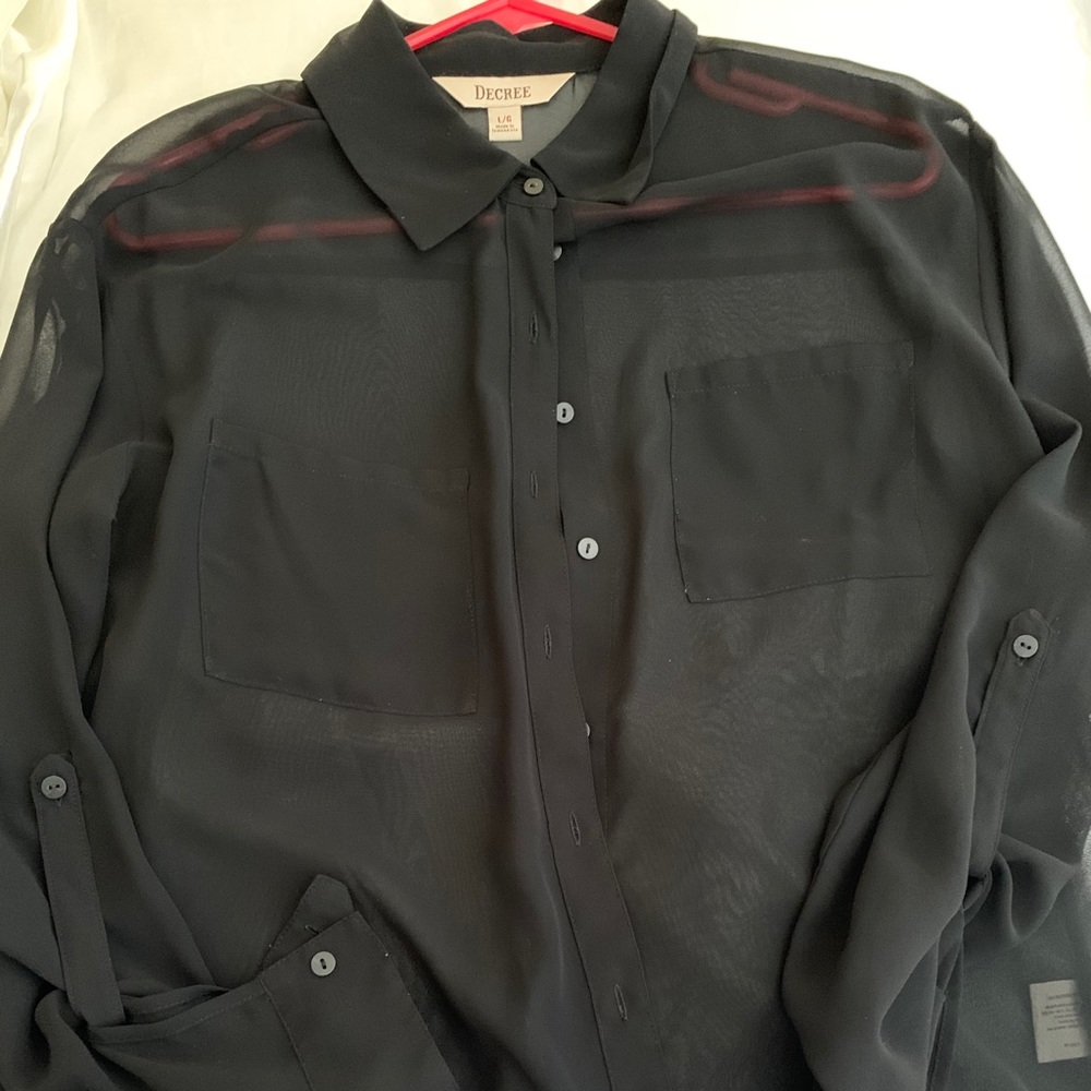 Black long sleeve sheer top.